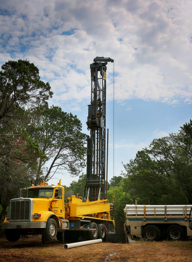 Drilling,A,Water,Well,On,Country,Land.,Modern,Rotary,Drill